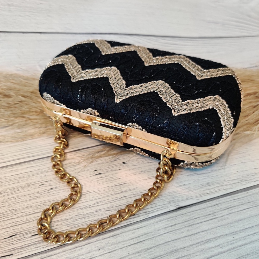David & Chiro vintage black and gold clutch